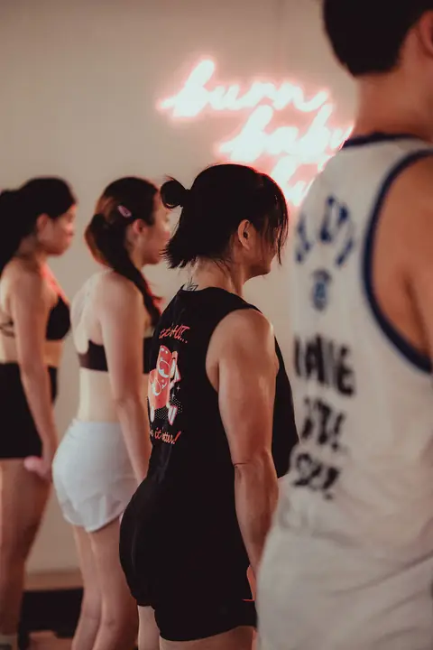 Friends chatting on their mats before a hot mat class