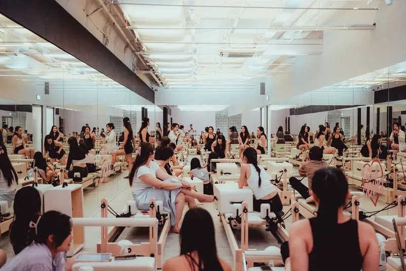 A full reformer room mid-class