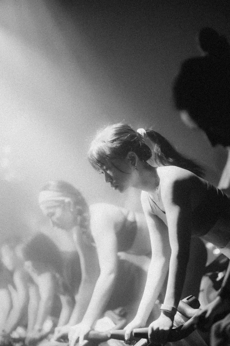 Black and white photo of a rider in haze